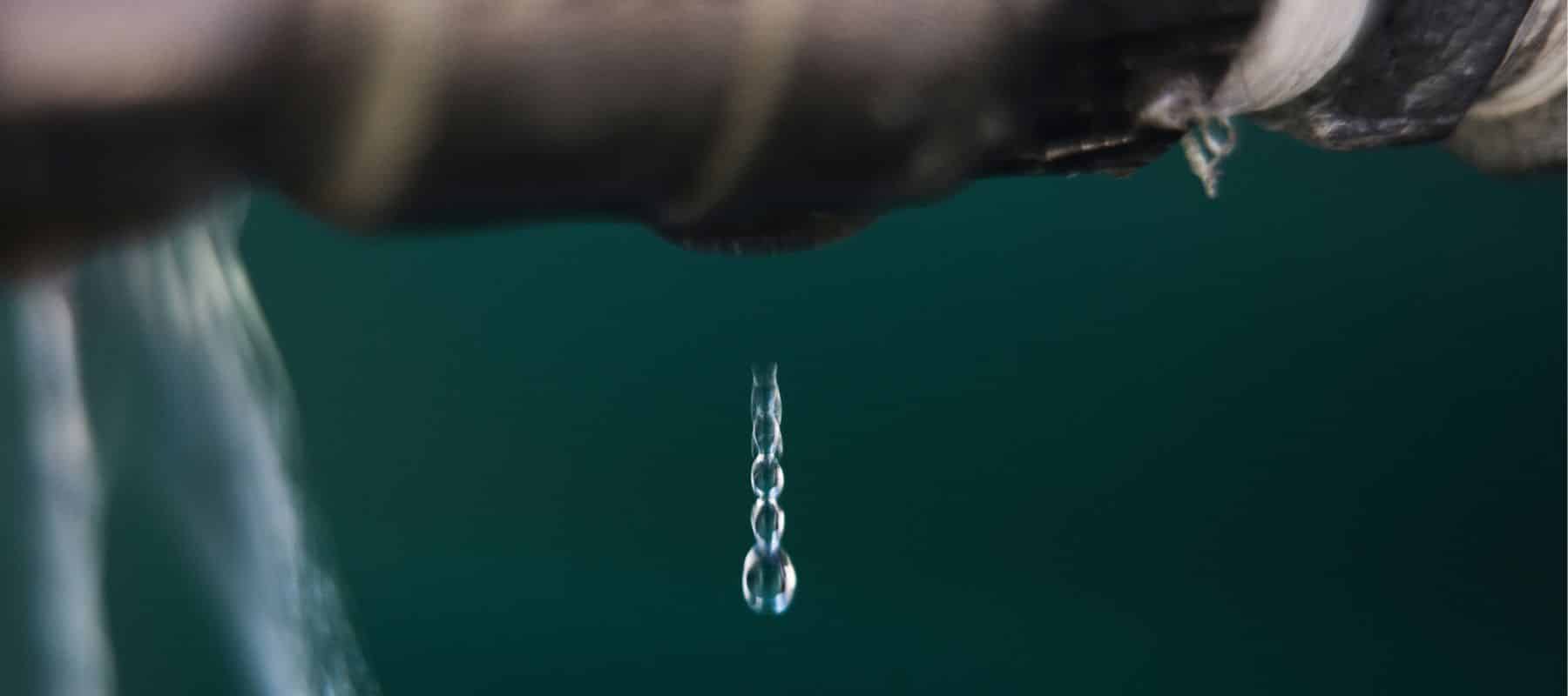 water droplet leaking out of a pipe